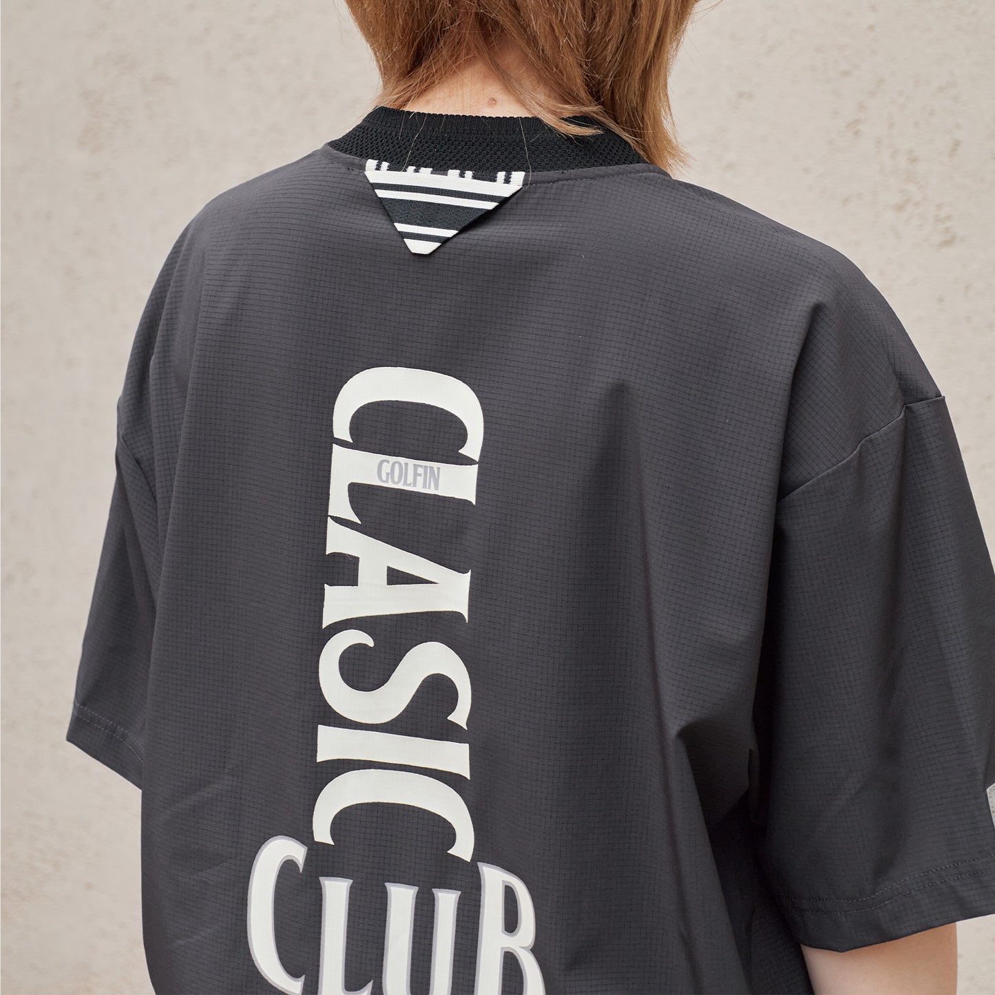 Hole In Fabric Solid Bomber
